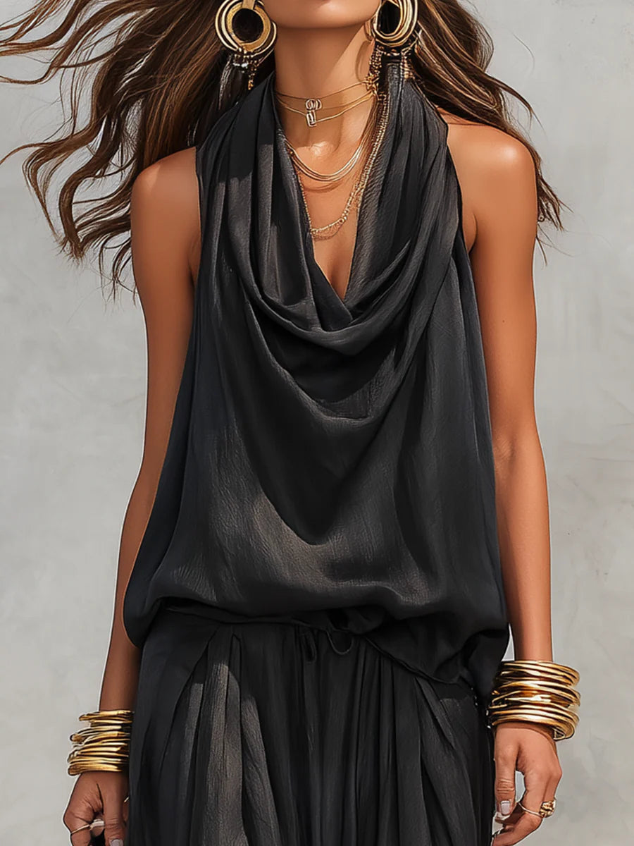 Summer-ready elegant two-piece set for women: draped cowl neck top & wide-leg trousers for a comfortable, stylish look.