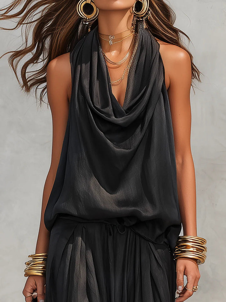Summer-ready elegant two-piece set for women: draped cowl neck top & wide-leg trousers for a comfortable, stylish look.