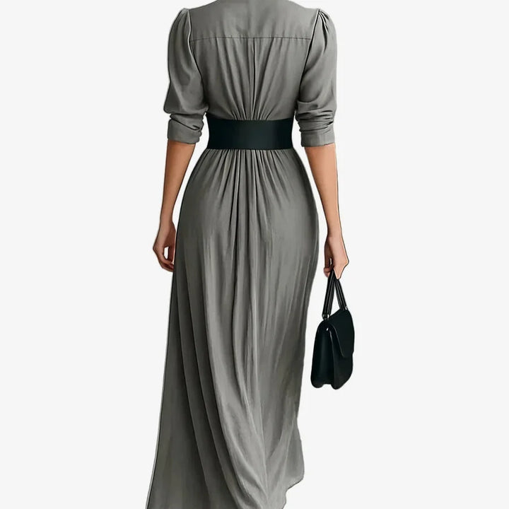 Close-up of women's draped V-neck midi dress, highlighting the soft fabric and elegant long sleeves, a versatile dress.