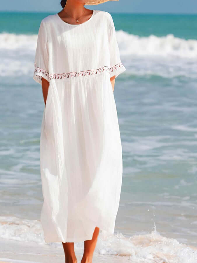 Comfortable women's loose fit casual day dress with elegant embroidery, ideal for summer fashion.