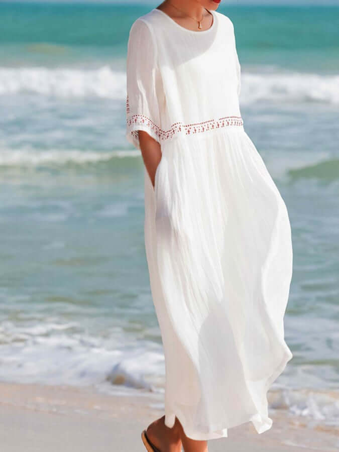 Versatile women's embroidered summer dress, loose fit for effortless style & elegant comfort.