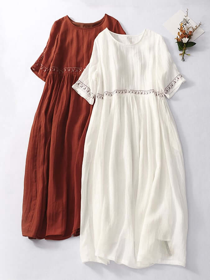 Elegant women's loose fit embroidered dress, providing ultimate comfort for stylish casual summer wear.