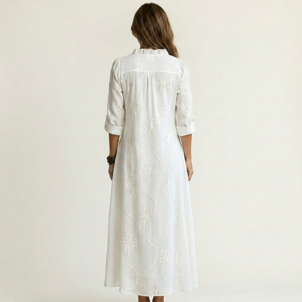 Beautiful floral embroidered maxi dress for women. Stylish summer comfort, ideal for vacation.