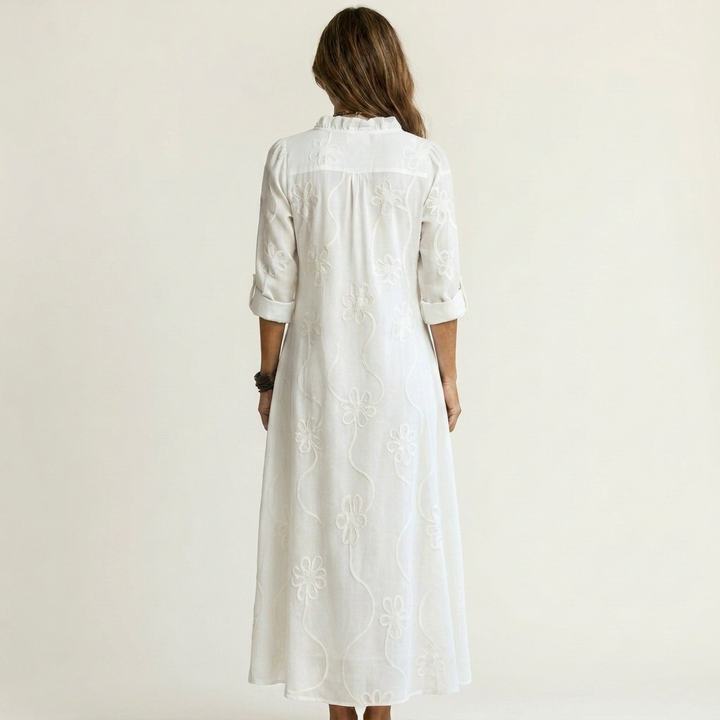Beautiful floral embroidered maxi dress for women. Stylish summer comfort, ideal for vacation.