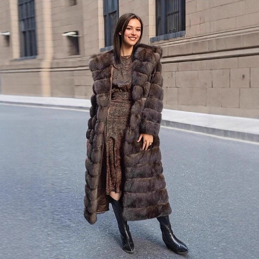 Warm and elegant women's faux fur jacket with detachable hood
