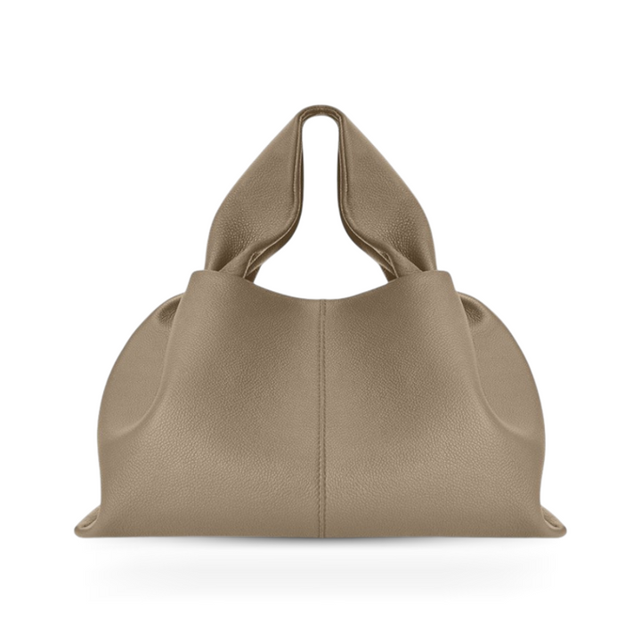 Durable faux leather women's shoulder bag, an elegant accessory with a strong magnetic snap closure.