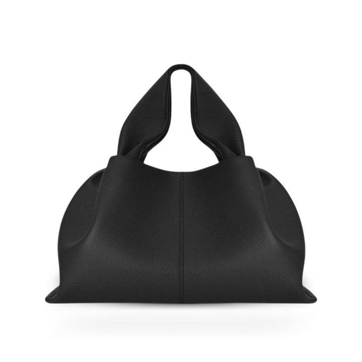 Modern women's elegant shoulder bag, faux leather with a secure and convenient magnetic clasp.