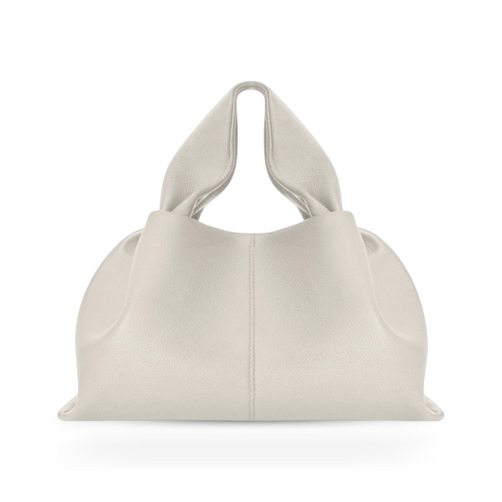Fashionable women's shoulder bag, easy to carry with an elegant look and strong magnetic closure.