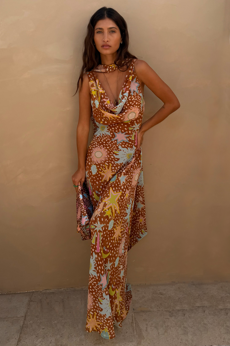 Flowy fawn print halter maxi dress with a sophisticated cowl neck. Ideal as a house dress or resort wear.