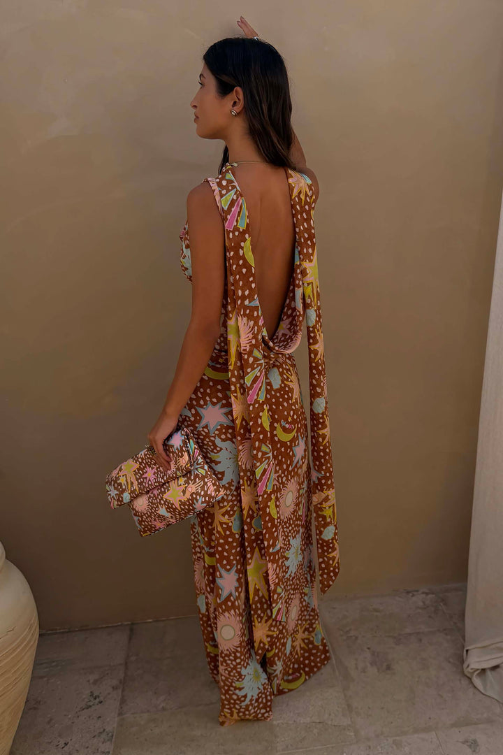 Stylish fawn print maxi dress with a flattering cowl neck, halter design, and a detachable scarf.