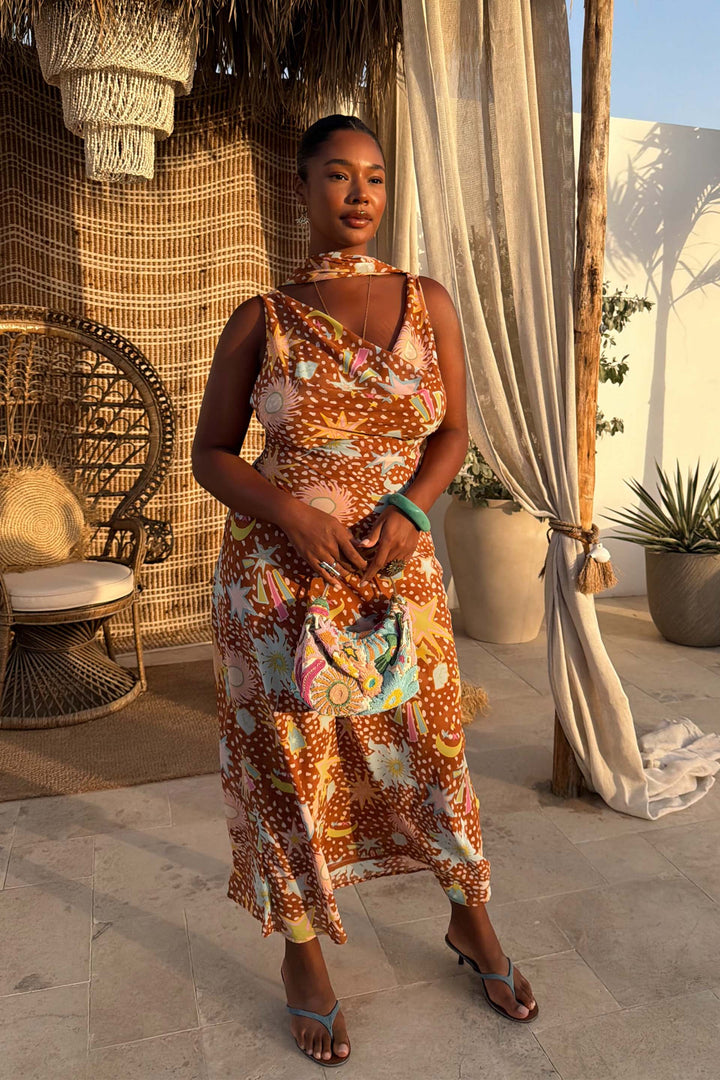 Elegant women's fawn print maxi dress, a stylish choice with a cowl neck and halter top for summer fashion.