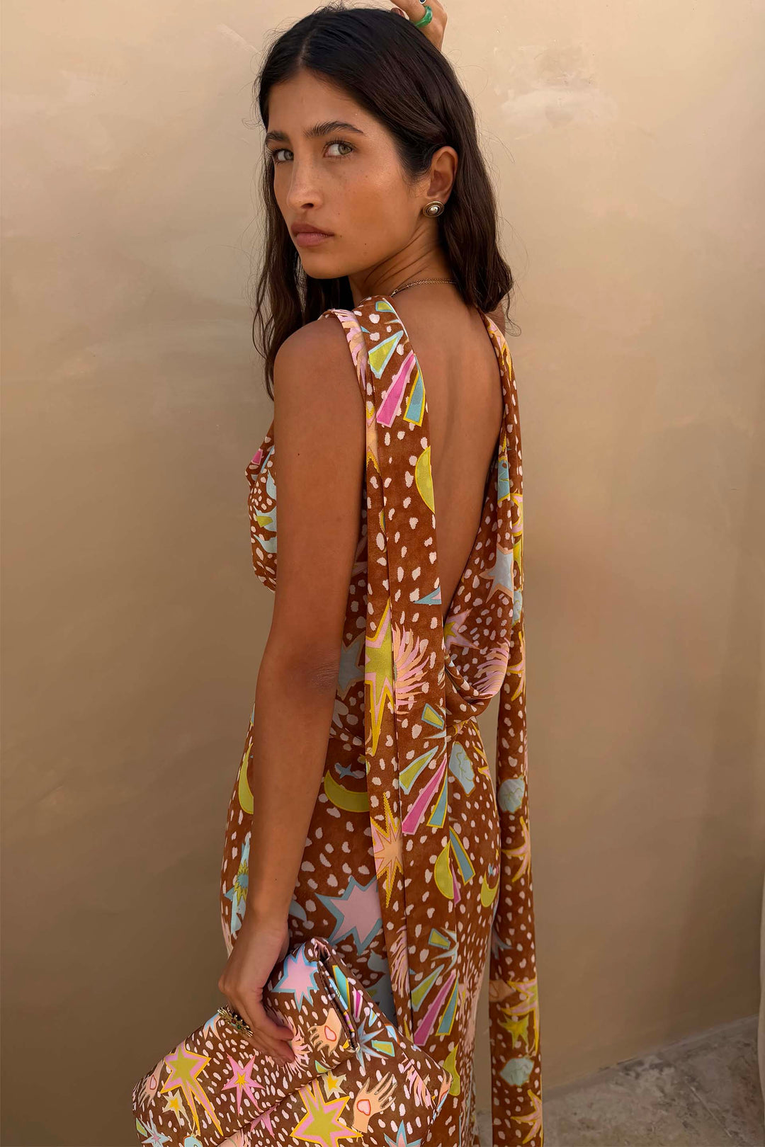 Women's fawn print halter maxi dress showing the alluring low back. Ideal for vacation & elegant wear.