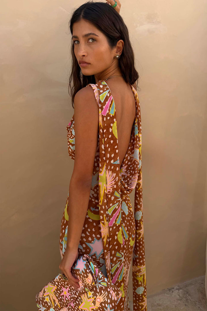 Women's fawn print halter maxi dress showing the alluring low back. Ideal for vacation & elegant wear.