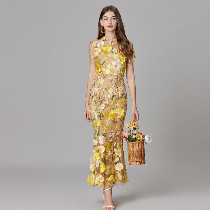 Women's elegant floral applique sleeveless maxi dress, perfect for special occasions.
