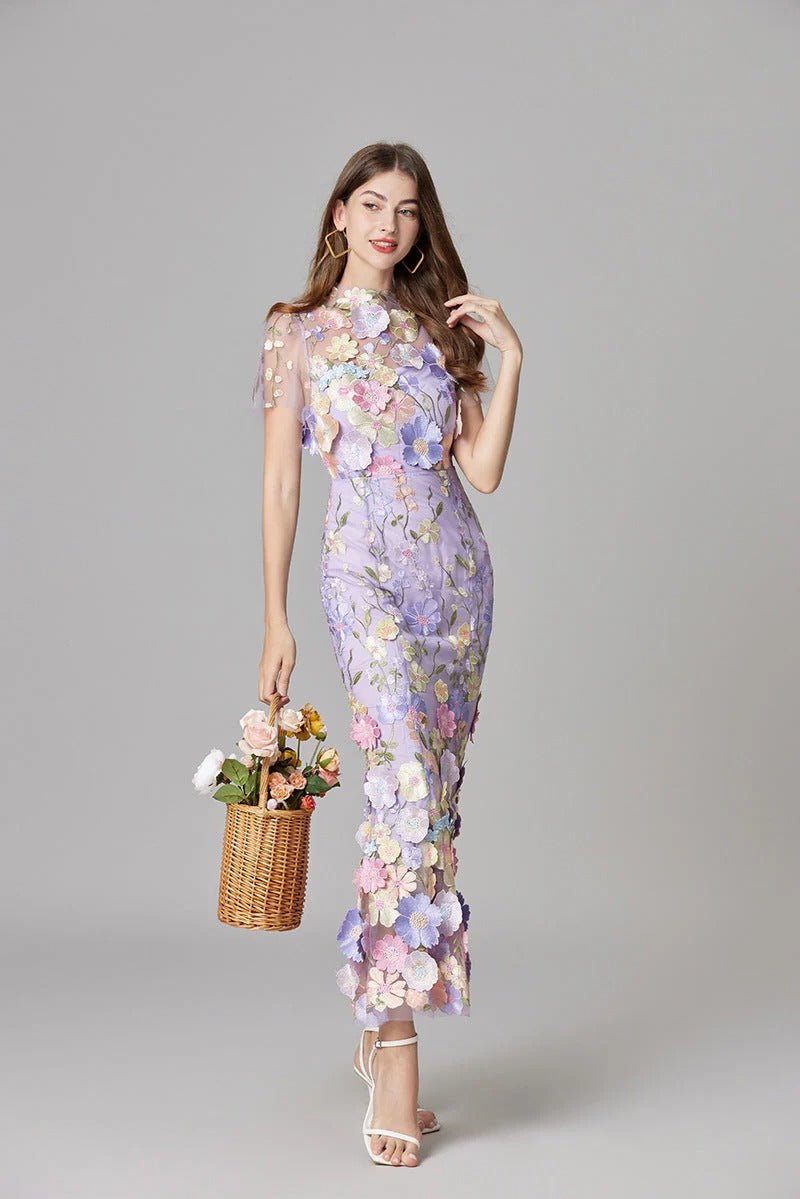 Elegant women's summer maxi dress with stunning floral applique, sleeveless design.