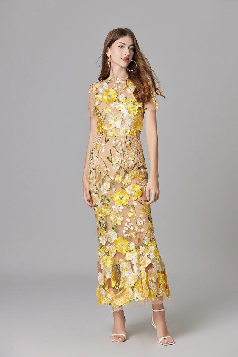Flowy elegant floral applique sleeveless maxi dress, showcasing timeless feminine style.