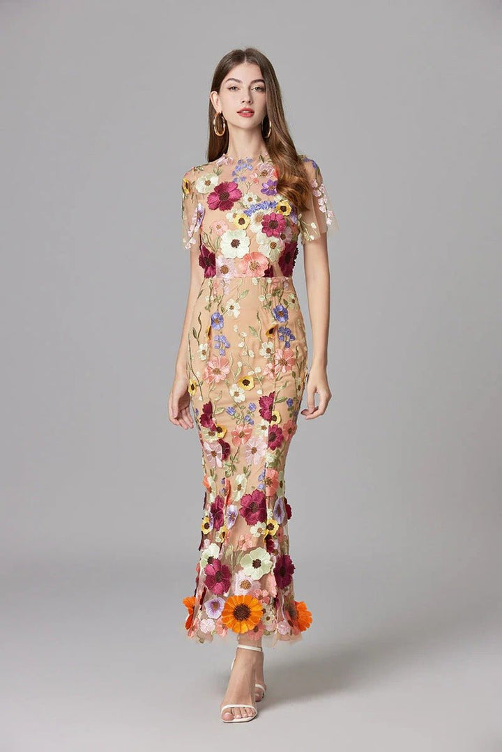 Long elegant women's maxi dress, with beautiful floral applique, great for parties.