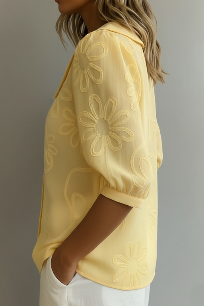 Elegant women's floral top, a timeless blouse with a relaxed fit for summer casual or sophisticated workwear.