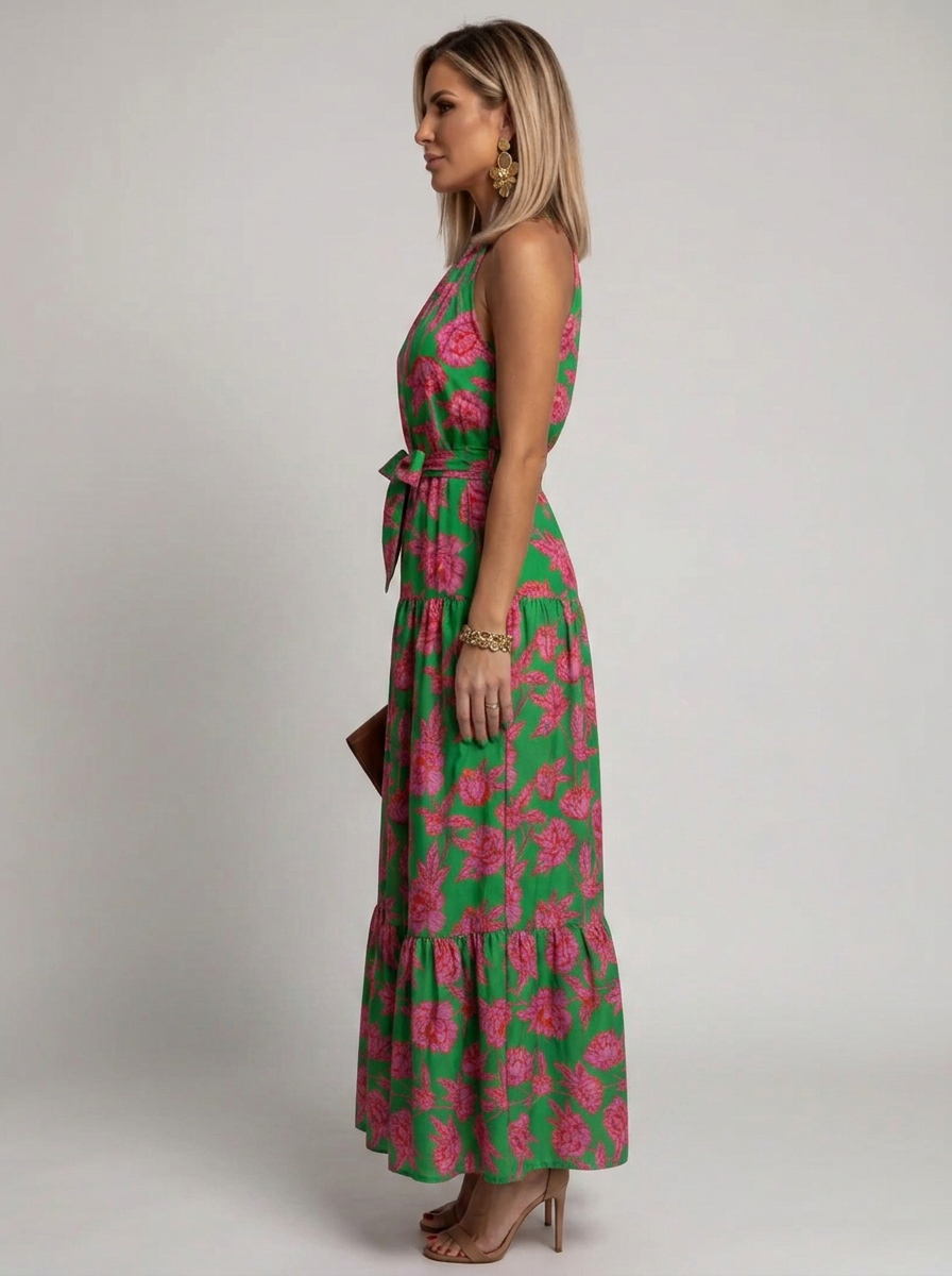 Sleeveless pull-on women's floral midi dress featuring a draped halter neckline and elegant tiered skirt.