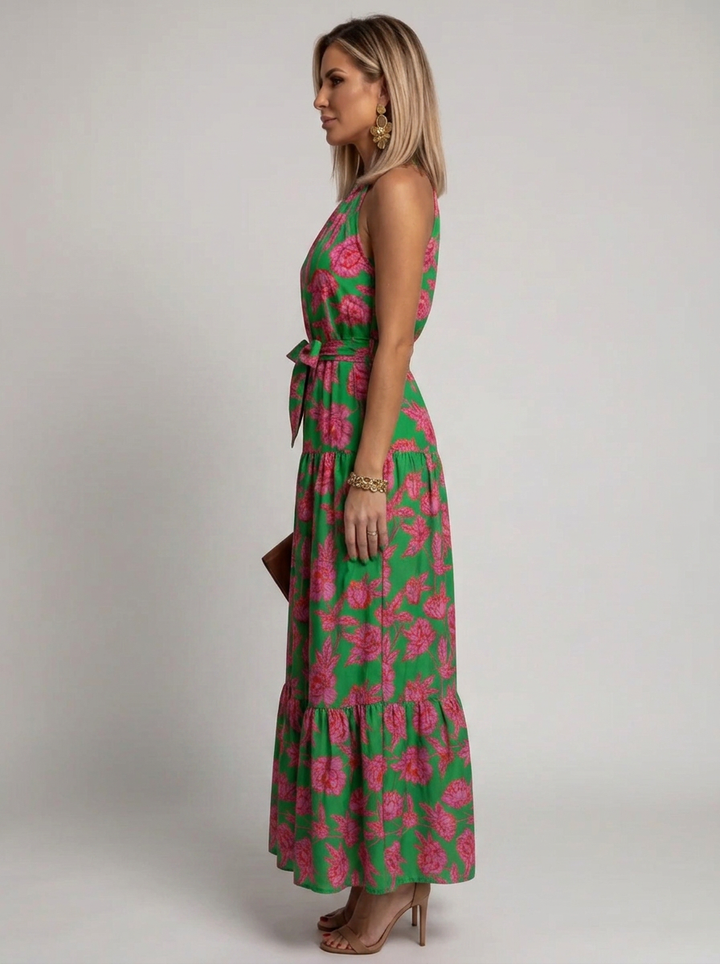 Sleeveless pull-on women's floral midi dress featuring a draped halter neckline and elegant tiered skirt.
