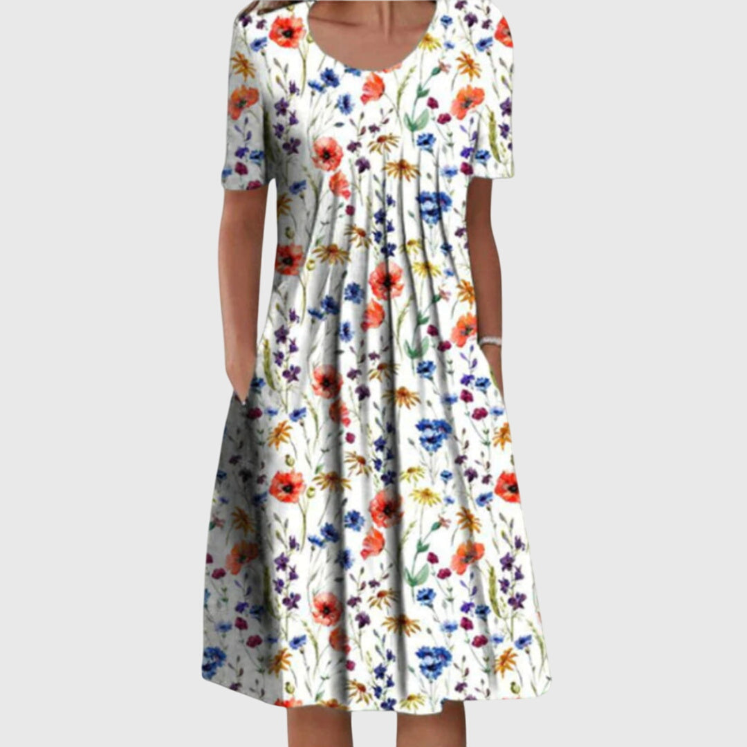 Women's elegant floral dress with a round neck, perfect for summer occasions or versatile casual wear.