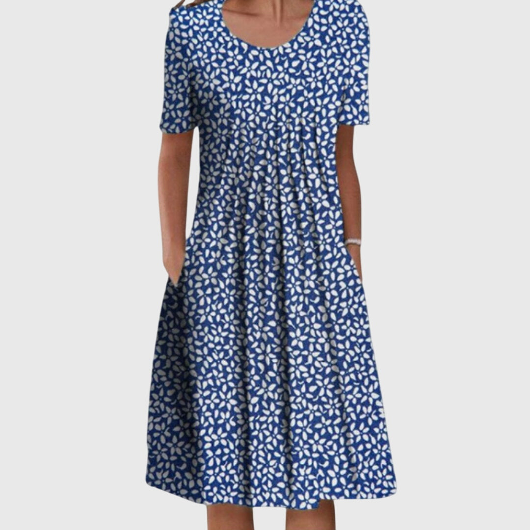 Versatile women's floral round neck dress, comfortable & elegant for casual or special summer occasions.