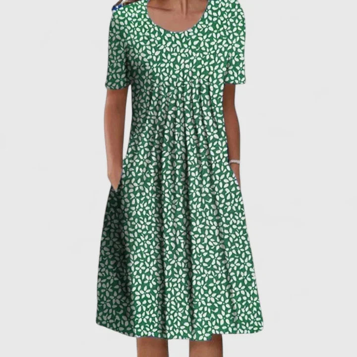 Women's comfortable floral dress with pockets; an elegant A-line design for any versatile event.