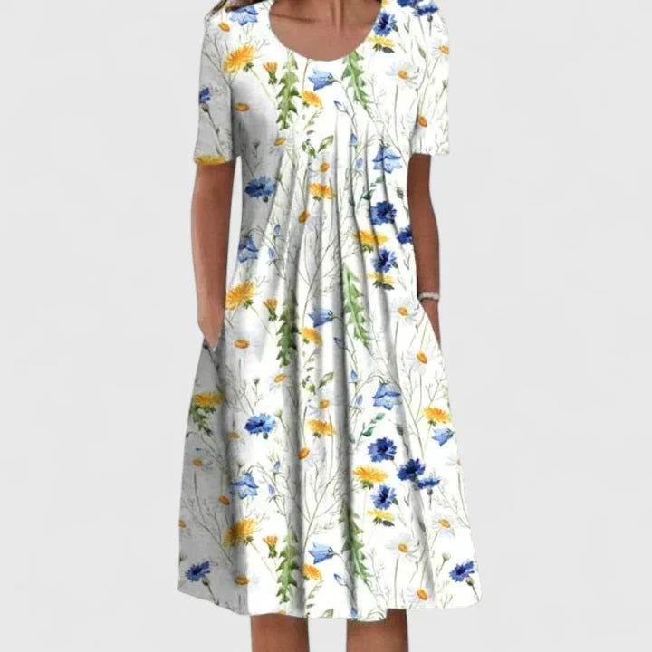 Chic women's floral print dress with pockets; a versatile, comfortable, and elegant wardrobe staple.