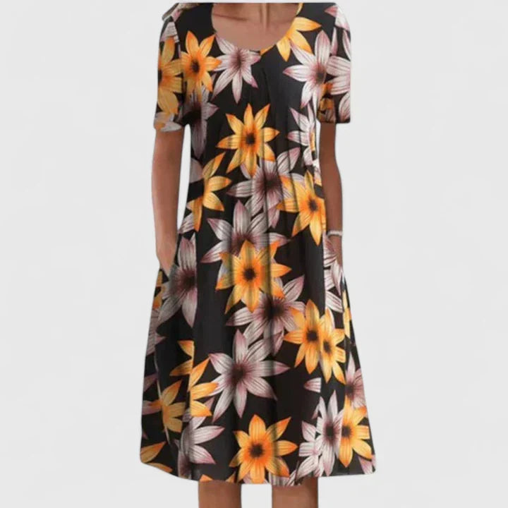Comfortable women's A-line floral dress with pockets; an elegant and versatile choice for any season.