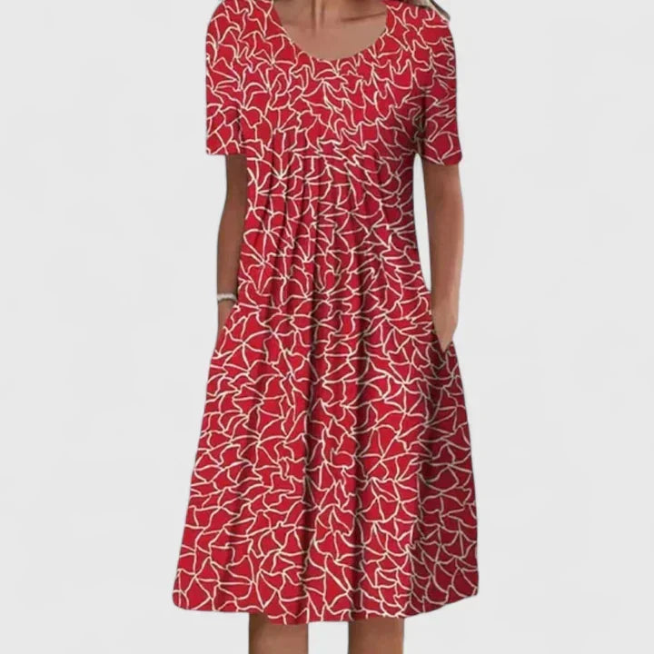 Elegant women's floral summer dress; comfortable, versatile, with practical pockets for everyday charm.
