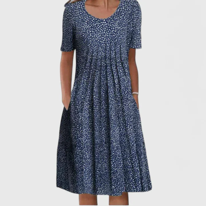 Stylish women's floral print party dress with pockets; an elegant and comfortable A-line silhouette.