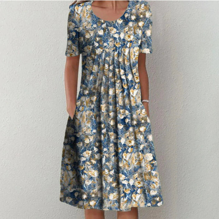 Feminine A-line floral dress with pockets; elegant & comfortable for summer events.