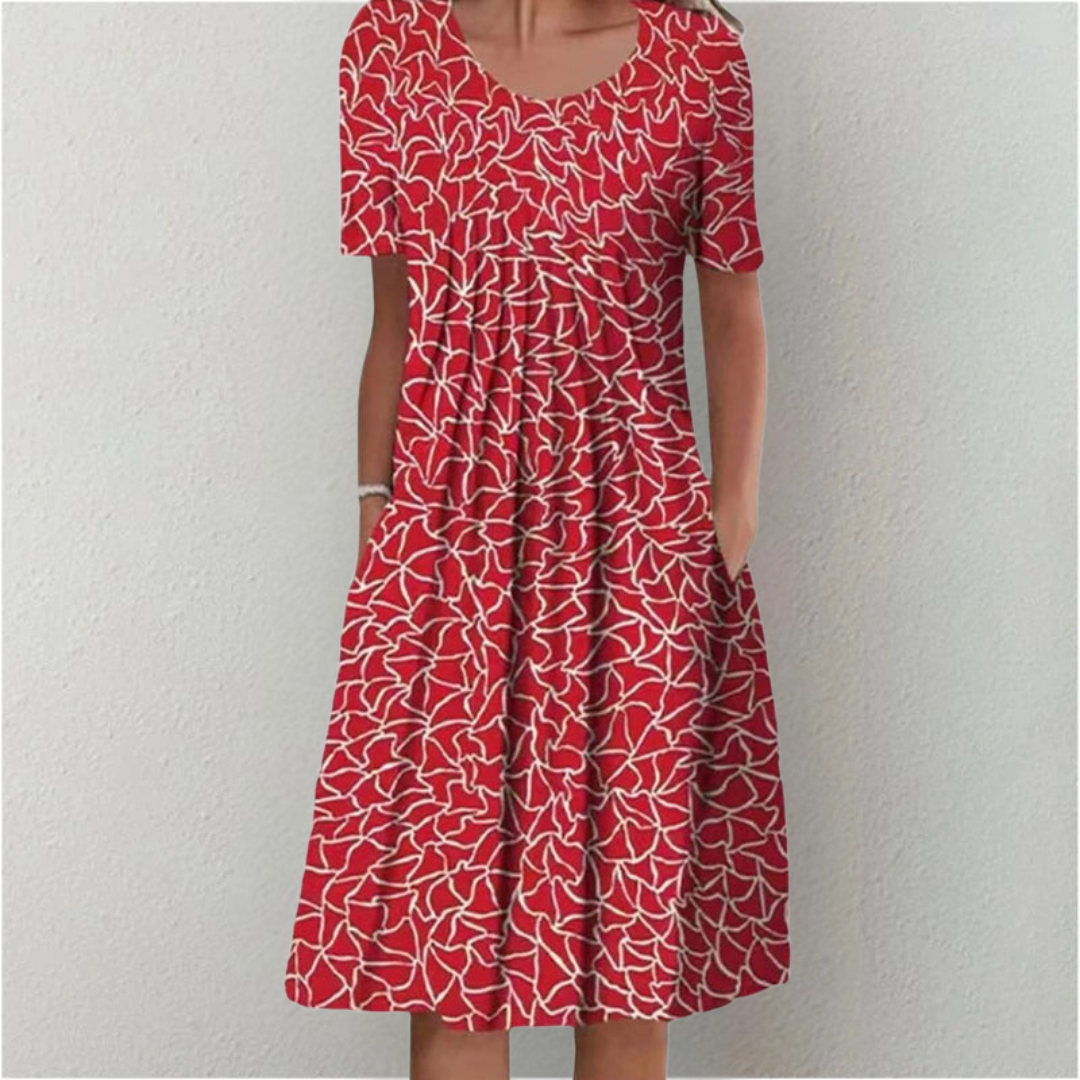 Comfortable women's A-line floral dress; elegant print, ideal for summer and versatile wear.