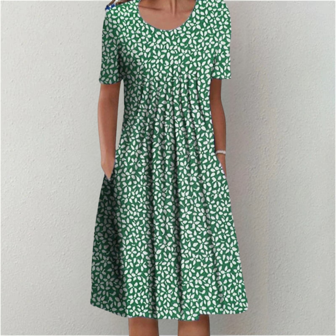 Feminine floral A-line dress for women; elegant, comfortable, and features useful pockets.