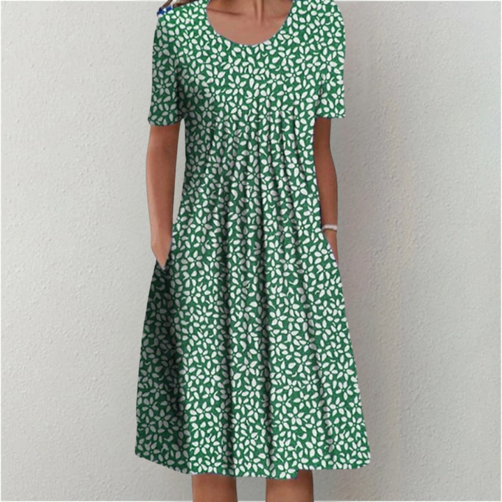 Feminine floral A-line dress for women; elegant, comfortable, and features useful pockets.