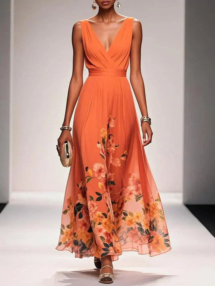 Stylish V-neck bodice of a sleeveless floral maxi dress, suited for elegant evening or party wear.
