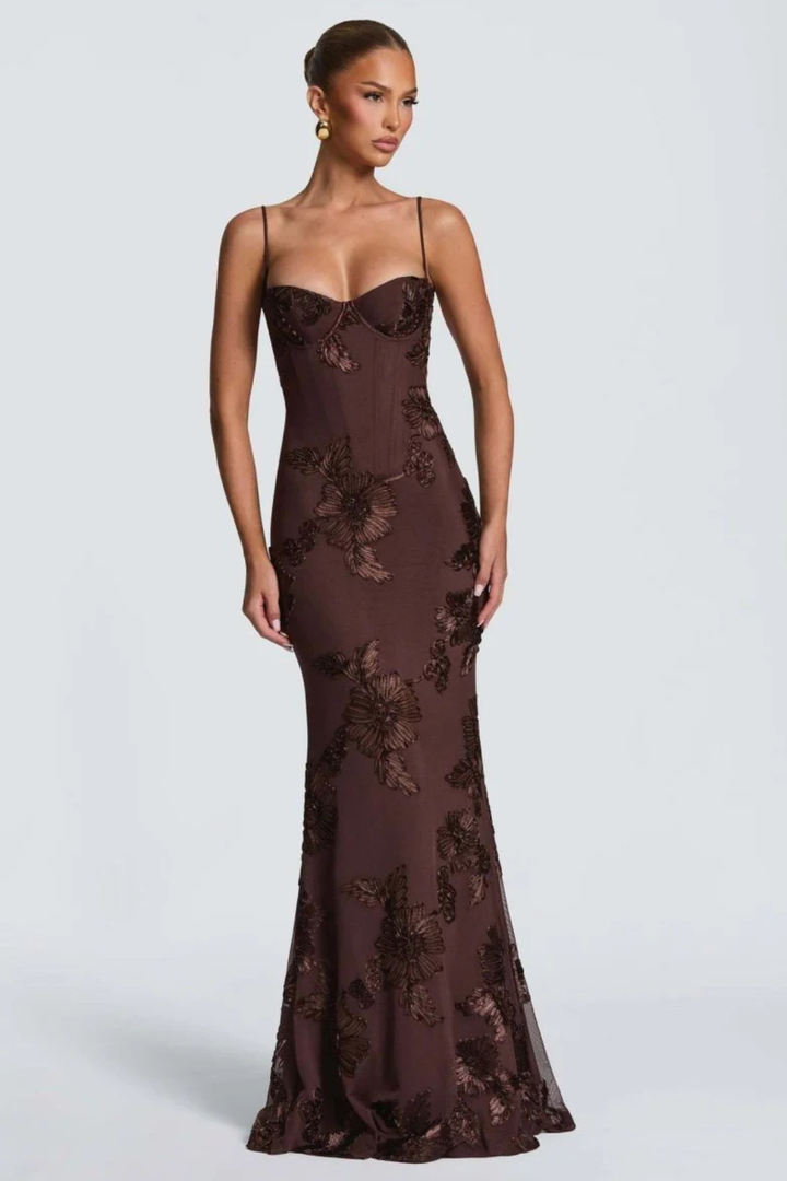 Detailed view of the floral embroidery on women's formal corset cami maxi dress.