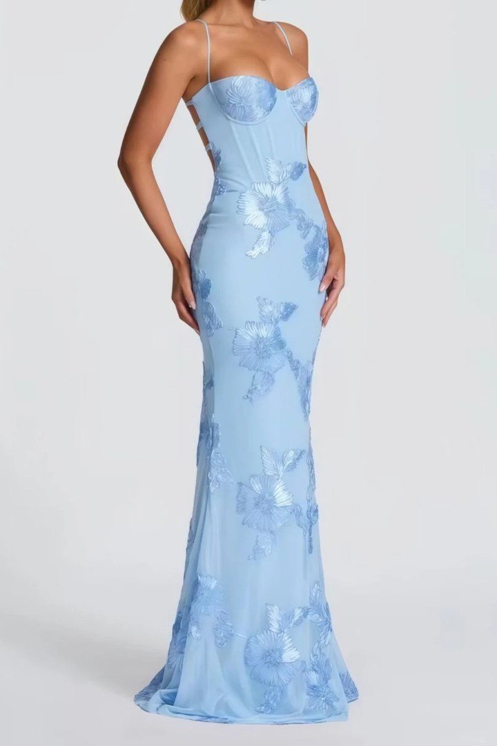 Flowing women's long floral dress, perfect as a wedding guest or formal evening gown.