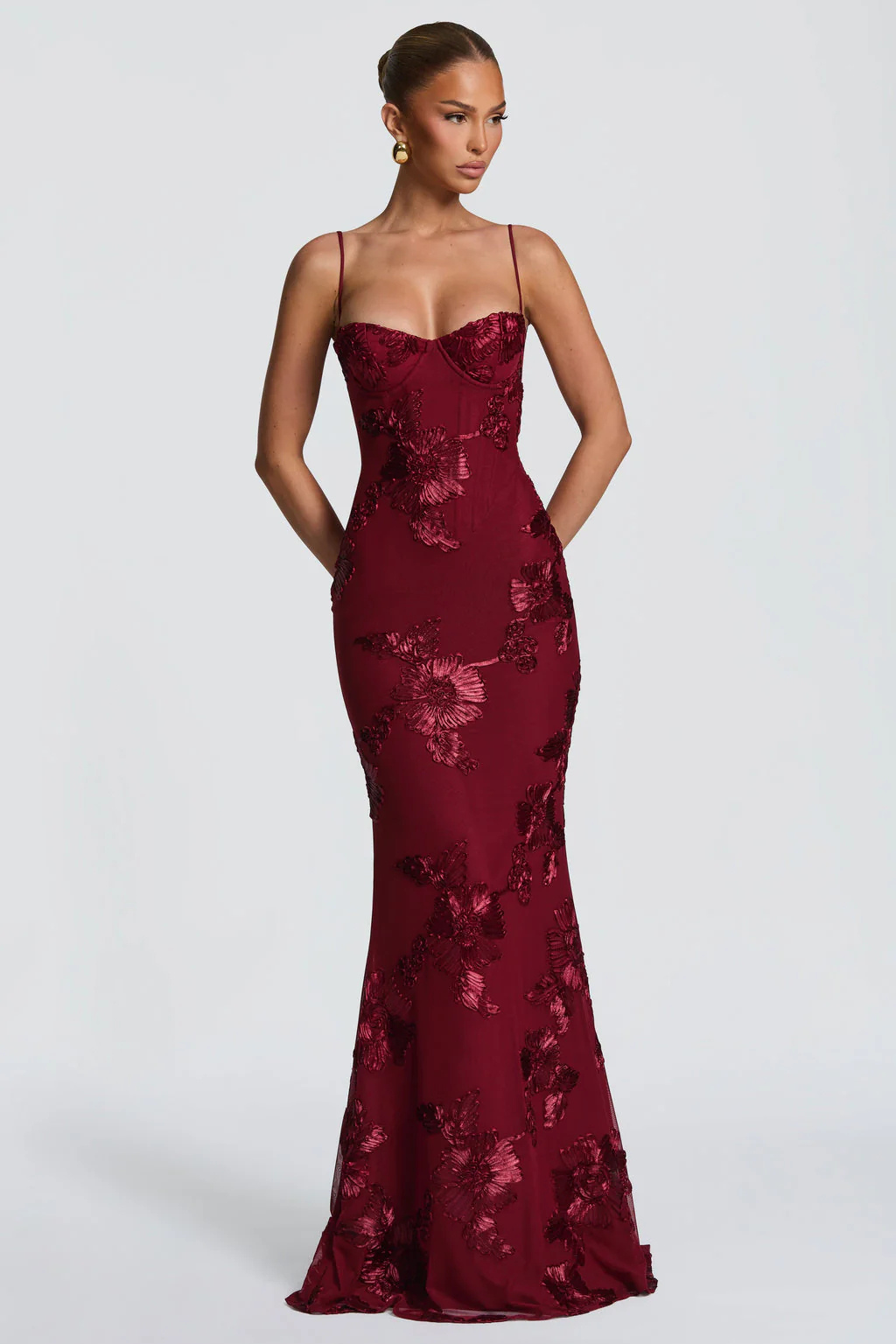 Women's formal wear: a stunning floral embroidered long dress with a corset cami silhouette.