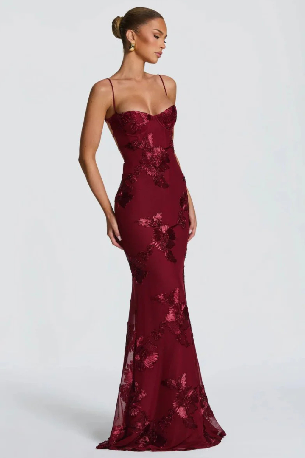Elegant women's special occasion dress: floral embroidered maxi with cami & corset details.