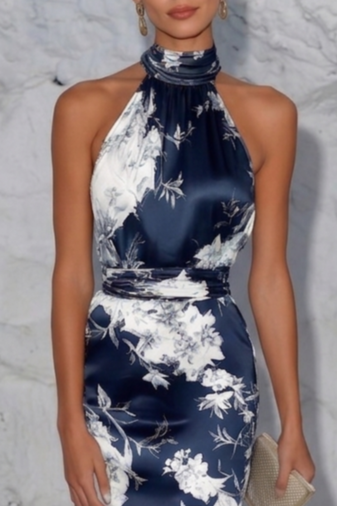 Flattering women's floral halter midi dress, a stylish and comfortable choice for any evening event.