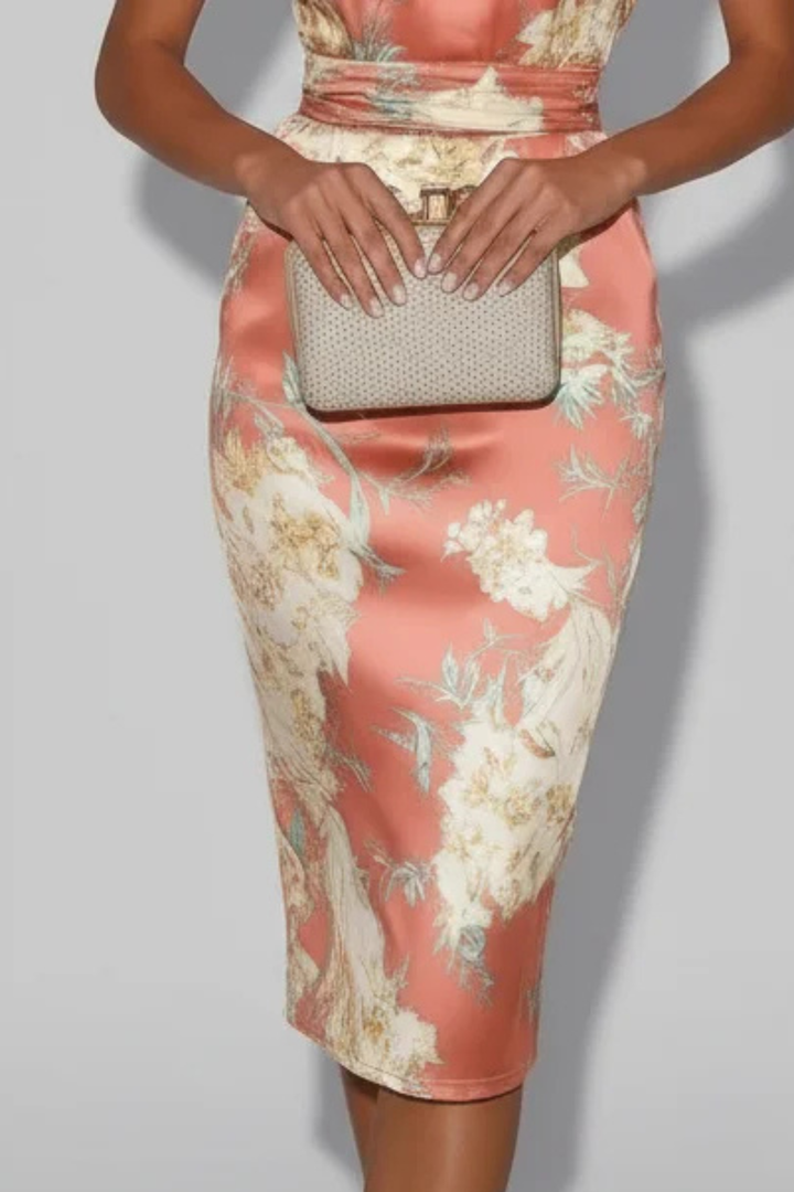Floral halter midi dress for women, a sophisticated special occasion dress with a flattering sheath cut.