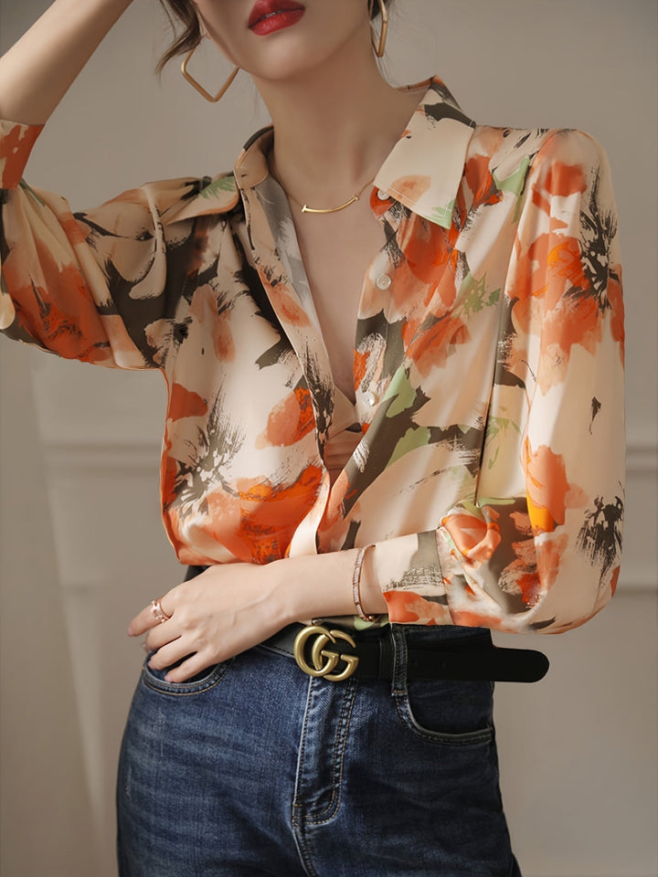 Women's elegant floral ink print blouse with a relaxed fit, perfect for smart casual spring fashion.