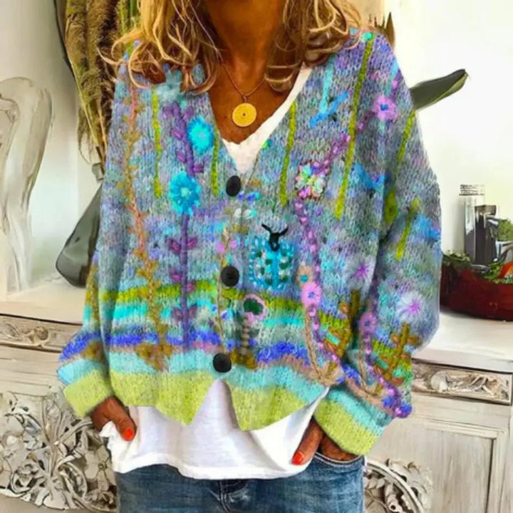 Women's long sleeve floral knit cardigan. Button-up, relaxed fit, ideal for elegant summer & boho casual wear.