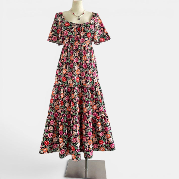 Vibrant floral print maxi dress for women, an elegant summer style with a relaxed fit.