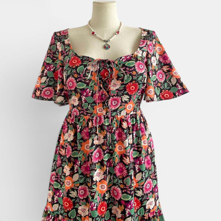 Women's elegant summer maxi dress with a delicate floral design, flowing and comfortable.