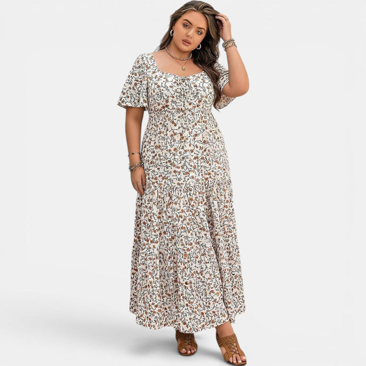Women's elegant floral maxi dress, great for a summer vacation, beach, or casual outing.