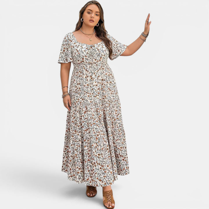 Elegant floral women's maxi dress, perfect for vacation or summer events. Boho-inspired.