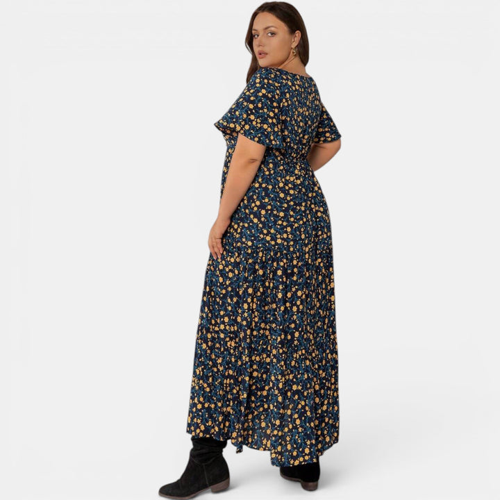 Pretty floral maxi dress, an elegant women's summer dress with a flowing silhouette and print.