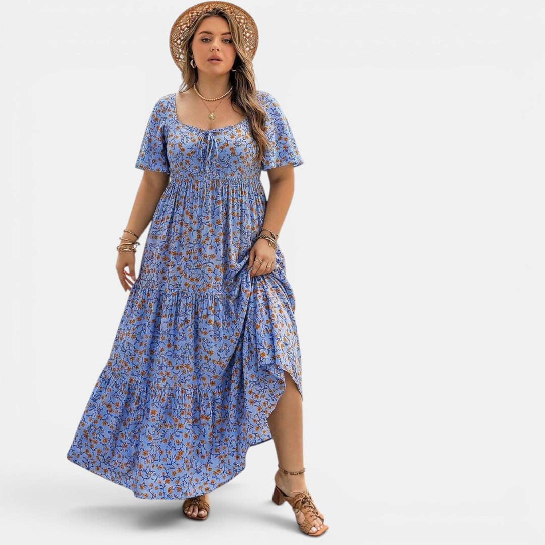 Breezy floral maxi dress, an elegant women's summer design for casual or vacation days. Soft feel.